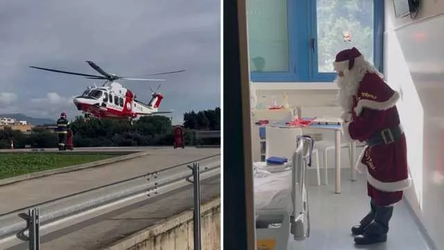 Babbo Natale arriva al Brotzu con l'elicottero della guardia costiera: 